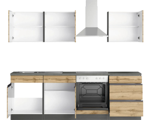 Cuisine équipée avec éléments hauts et bas et hotte aspirante.