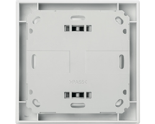 Arrière d''un cache d''interrupteur blanc avec ouvertures de montage