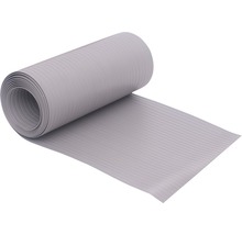 Tapis antidérapant enroulé avec surface nervurée.