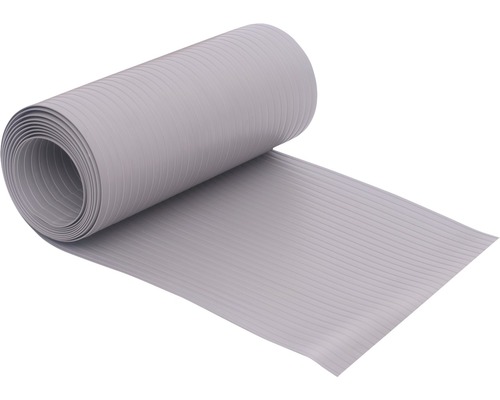Tapis antidérapant enroulé avec surface nervurée.