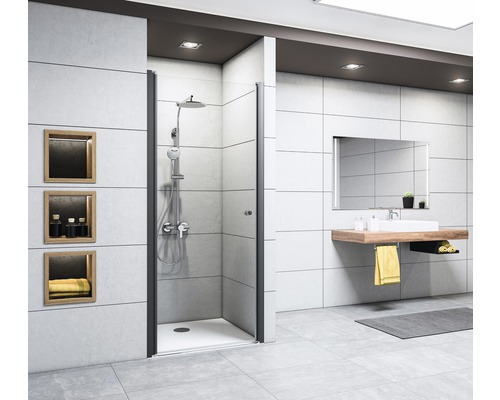 Porte pivotante pour niche Breuer Elana 6 100 cm butée à gauche, décor Lines, profilé couleur noir Salle de bains lumineuse avec douche, lavabo et miroir