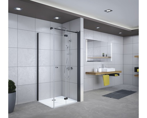 Salle de bain avec cabine de douche, lavabo et miroir