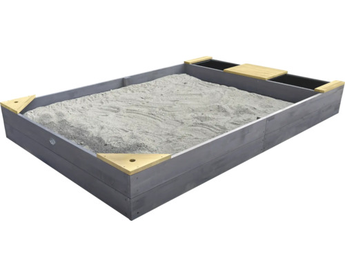 Bac à sable en bois rempli de sable avec surfaces de rangement