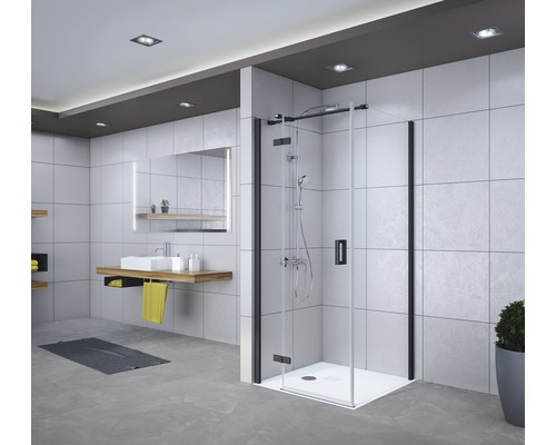 Salle de bains avec cabine de douche à cadre noir, meuble-lavabo et miroir