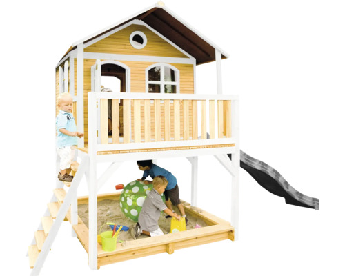 Maisonnette avec bac à sable et toboggan pour que les enfants jouent dans le jardin