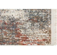 Vue détaillée d''un tapis à motifs avec des franges