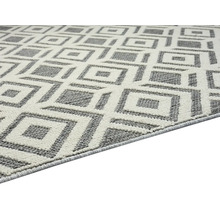 Tapis avec motif géométrique en losanges