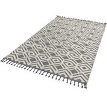 Tapis avec motif géométrique et franges