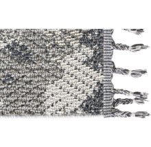 Vue détaillée d''un tapis avec des franges
