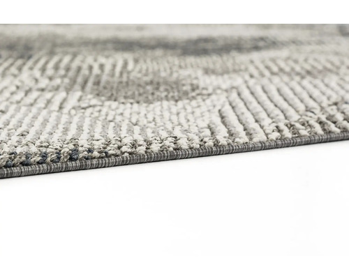 Vue détaillée d''un tapis gris à motifs