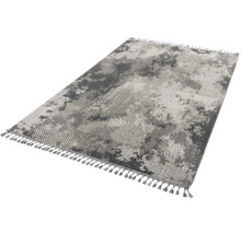Tapis avec motif abstrait et franges