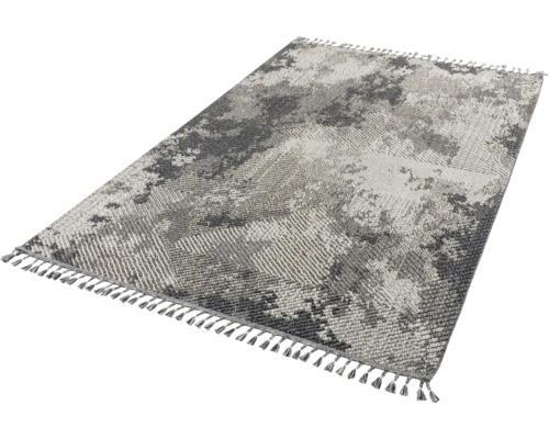 Tapis avec motif abstrait et franges