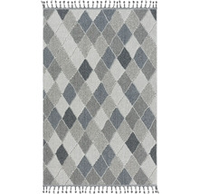 Tapis avec motif losanges et franges