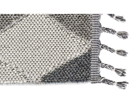 Vue détaillée d''un tapis avec des franges