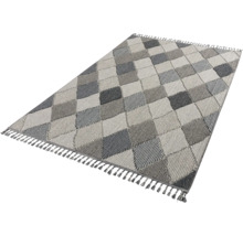 Tapis à motif losanges et franges