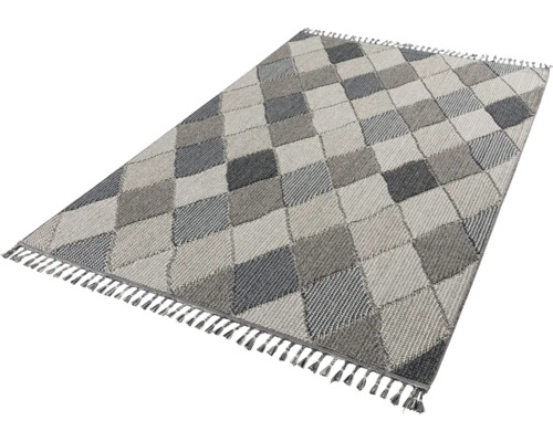 Tapis à motif losanges et franges