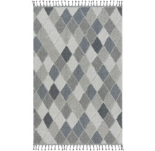 Teppich mit Rautenmuster und Fransen