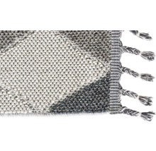 Detailansicht eines Teppichs mit Fransen