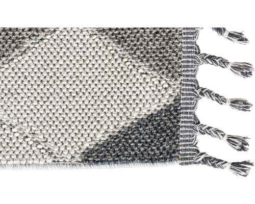 Detailansicht eines Teppichs mit Fransen