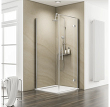 Cabine de douche avec pommeau de douche, étagère et porte-serviettes dans la salle de bain