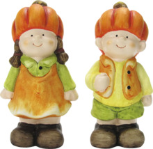 Dekorative Kürbisfiguren für Herbstdekorationen, ein Mädchen und ein Junge
