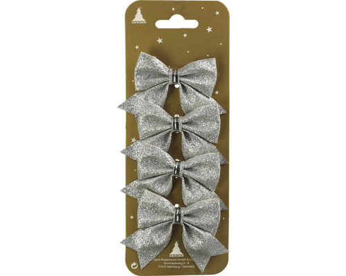 Vier silberne Schleifen als Weihnachtsbaumschmuck in Verpackung