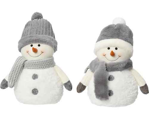 Deux bonhommes de neige en tissu avec bonnets et écharpes
