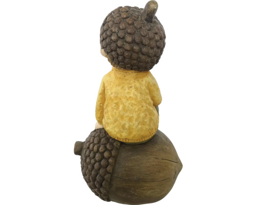 Figurine décorative d''un garçon assis sur un gland, vue arrière