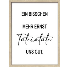 Gerahmtes Wandbild mit dem Text: Ein bisschen mehr Ernst täte uns gut.