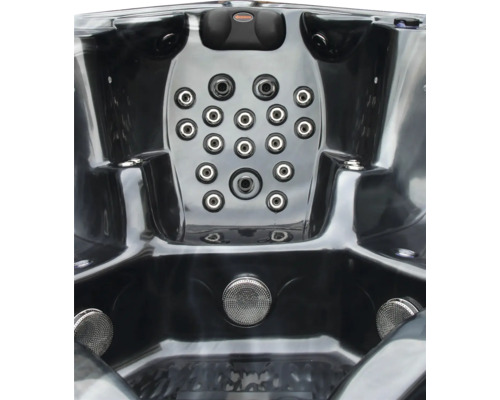 Vue détaillée d''un jacuzzi avec jets et commandes.