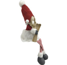 Figurine décorative de skieuse avec bonnet rouge et jambes rayées