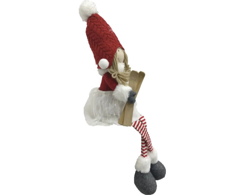 Dekorative Skifahrerin Figur mit roter Mütze und gestreiften Beinen