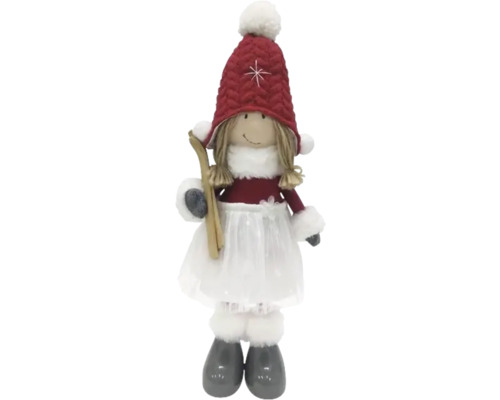 Dekorative Stoffpuppe mit Skiern und Winterkleidung