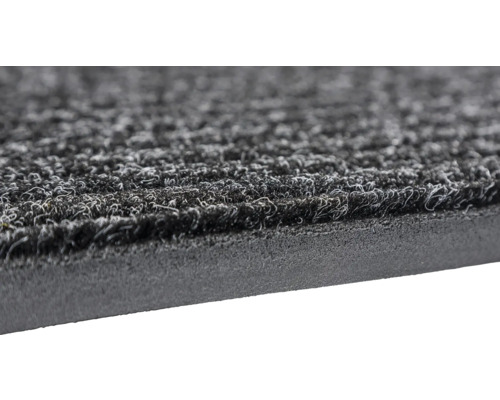 Vue détaillée d''un paillasson noir avec surface en moquette