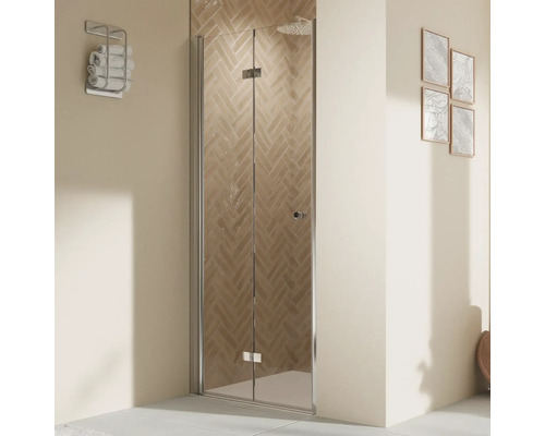 Porte de douche dans niche avec porte pivotante pliante BREUER Elana 2.0 90 x 200 cm couleur du profilé rond noir décor de vitre verre transparent butée de porte à gauche poignée tampon Cabine de douche avec porte pliante dans une salle de bains.