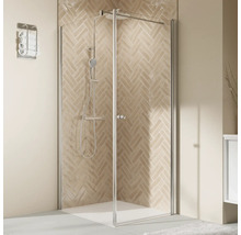 Cabine de douche avec porte en verre et ensemble de douche dans la salle de bain