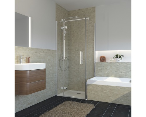 Salle de bains claire avec douche, meuble sous-lavabo et baignoire