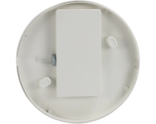 Face inférieure d''un détecteur de fumée avec compartiment à piles