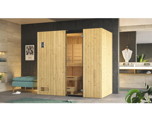 Sauna moderne en bois avec porte en verre dans une salle de bain.