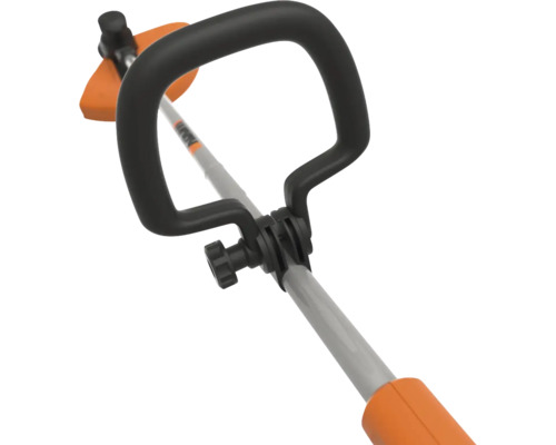 Gros plan d''un coupe-bordures avec poignée