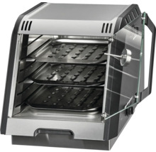 Four multifonction avec trois grilles et une porte en verre ouverte