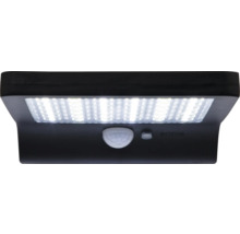 Lampe solaire LED noire avec détecteur de mouvement pour l''extérieur.