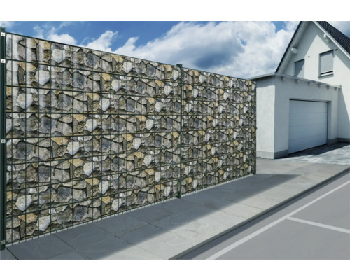 Mur de gabions avec remplissage en pierres comme limite de propriété