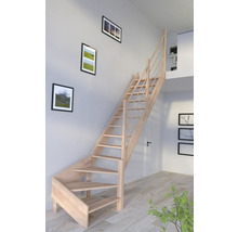 Vue d''une pièce avec escalier en bois et décorations murales