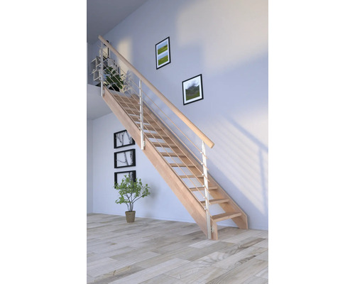 Escalier en bois avec rampe en acier inoxydable dans une pièce lumineuse