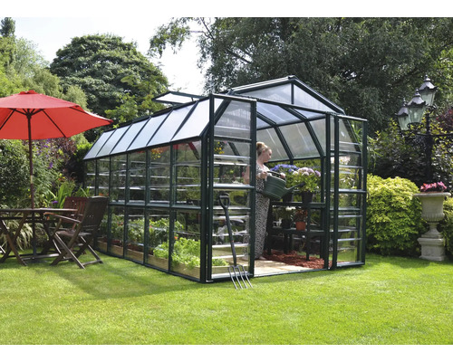 Serre de jardin avec table de jardin et parasol