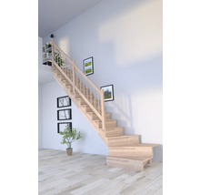 Escalier en bois clair avec rampe dans une pièce meublée moderne avec des tableaux au mur et des étagères