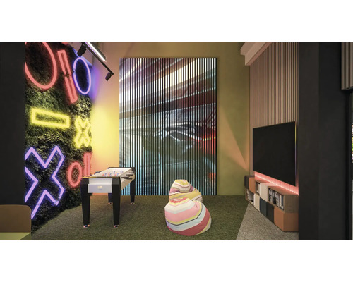 Intérieur moderne avec baby-foot, décoration murale et poufs dans une pièce lumineuse.