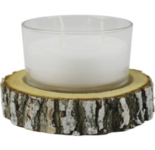 Bougie dans un verre sur une rondelle de bois