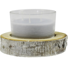 Bougie dans un verre sur un support en bois de bouleau
